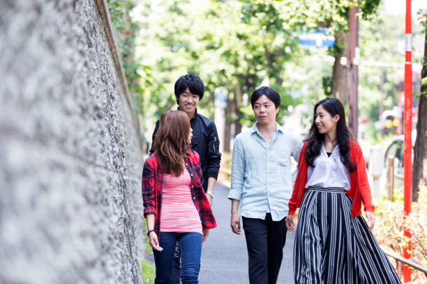 istock Group of friends walking together 820969534