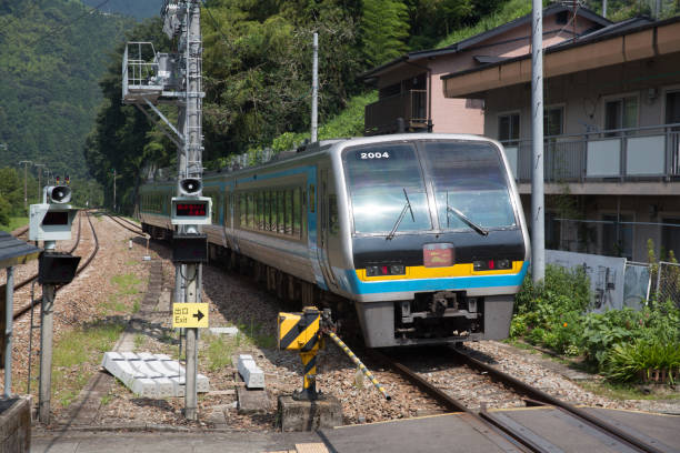 Miyoshi, Japan - July 20, 2016 : JR Shikoku Nanpu limited express train service at Oboke Station in Miyoshi, Tokushima Prefecture, Shikoku, Japan. The train runs from Okayama to Kochi, Nakamura, and Sukumo.