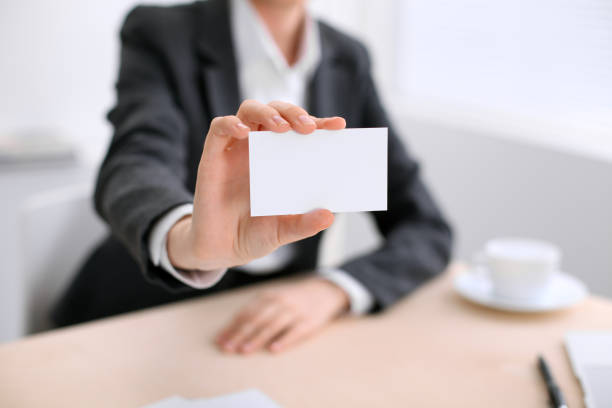 istock Business woman giving visit card 820970568