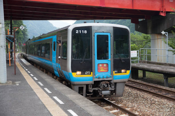 Miyoshi, Japan - July 20, 2016 : JR Shikoku Nanpu limited express train service at Oboke Station in Miyoshi, Tokushima Prefecture, Shikoku, Japan. The train runs from Okayama to Kochi, Nakamura, and Sukumo.