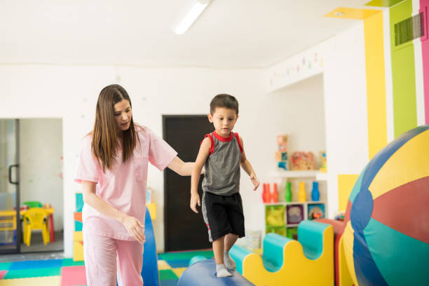 istock Boy walking and maintaining balance 820973060