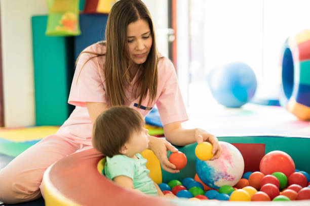 istock Baby having fun in ball pool 820973394