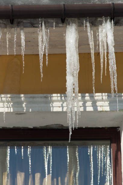 istock Eaves, snow and dropping. 820978750