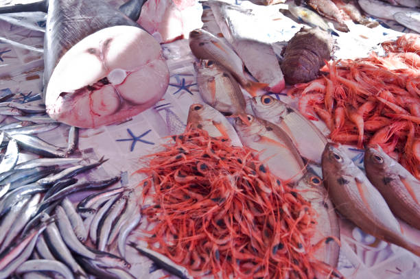istock fish and prawns at the market 820979968