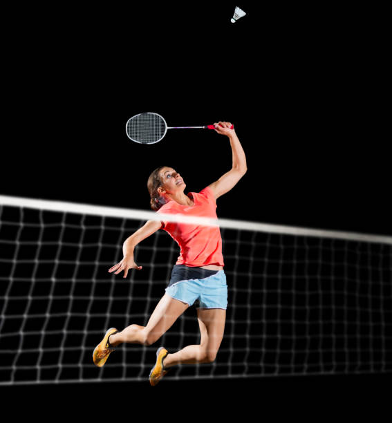 istock Woman badminton player isolated (with net version) 820988756