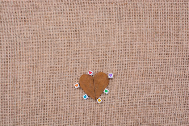 istock Colorful cubes with a heart  on leaf 821002344