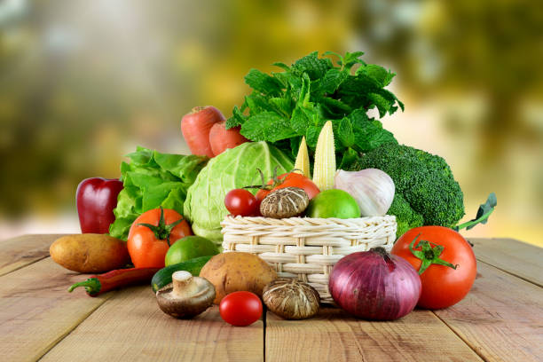 istock Fresh vegetables on wooden and blur background. 821008486