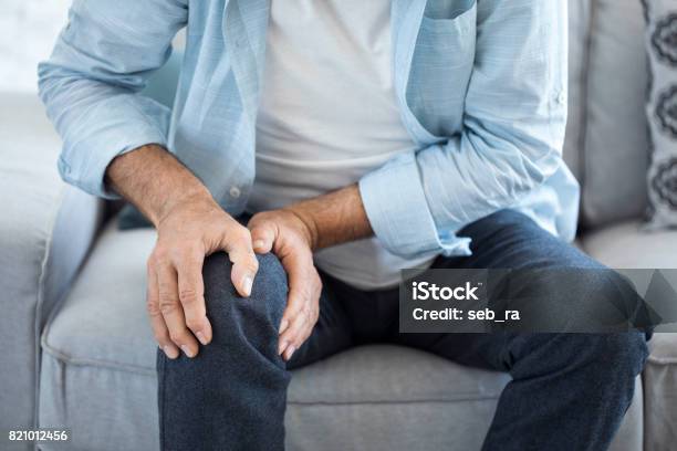 Old Man Suffering From Knee Pain Stock Photo - Download Image Now - Pain, Knee, Leg