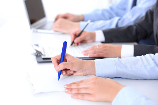 istock Group of business people working together in office 821015622