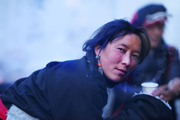 Tibetan pilgrim in the Ganden Monastery located at the top of Wangbur Mountain, Lhasa Tibet