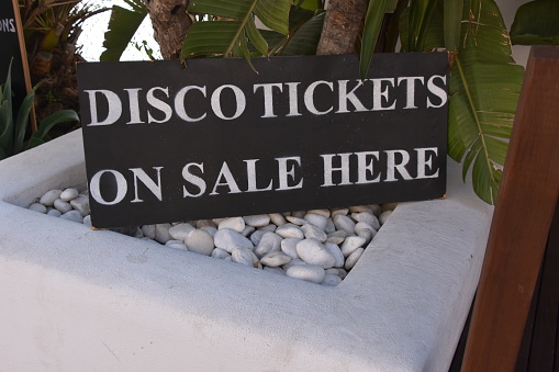 Selling tickets to a discotheque