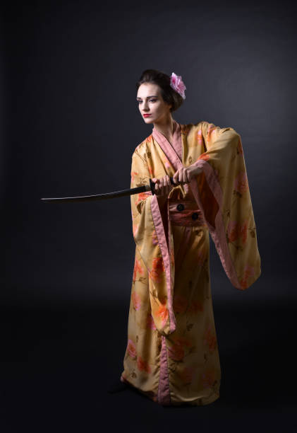 istock Woman in kimono with sword. 821024290