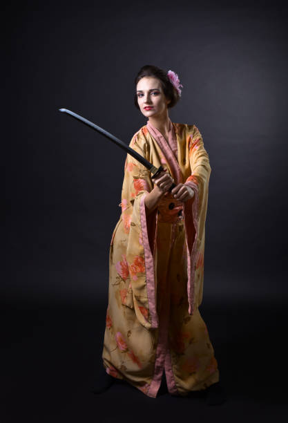 istock Woman in kimono with sword. 821024306