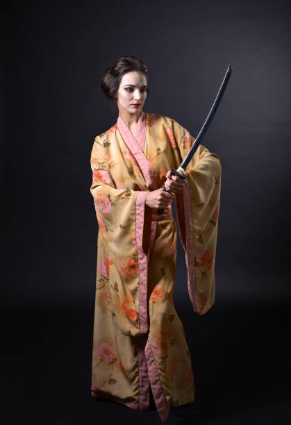 istock Woman in kimono with sword. 821024312