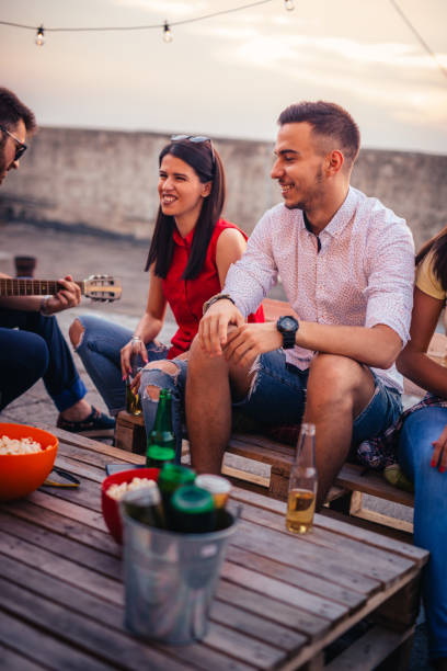 istock Young friends on the rooftop building 821024864