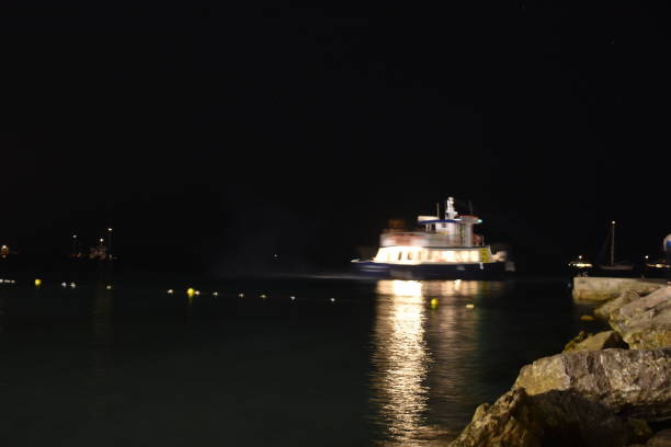 istock A boat in the sea at night 821024874