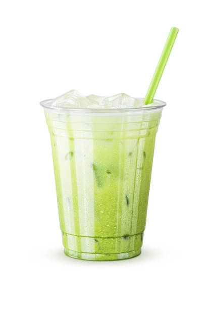 istock Cold Iced Green Tea (Matcha) Latte with Straw on White Background 821032460