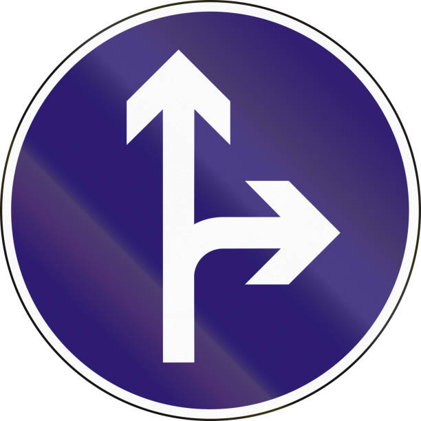 istock Road sign used in Hungary - Straight or right ahead 821034964