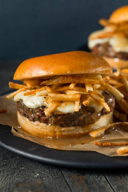 istock Homemade Poutine Hamburger with Fries 821034980