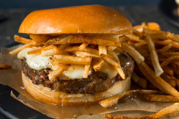 istock Homemade Poutine Hamburger with Fries 821038442