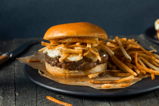 istock Homemade Poutine Hamburger with Fries 821043214