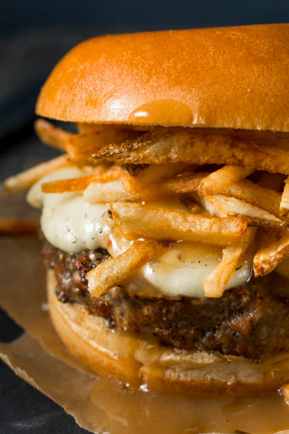 istock Homemade Poutine Hamburger with Fries 821048644