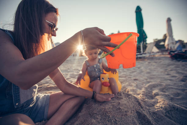 istock Mother enjoying with baby daughter 821049256