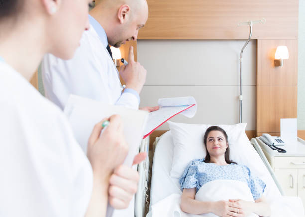 istock Medical Team Visit Patient In Hospital 821052110