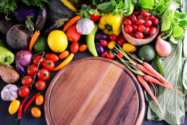 istock Fresh vegetables on wooden, Food background. 821057312