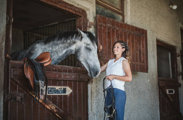 istock Woman love her horse 821057320