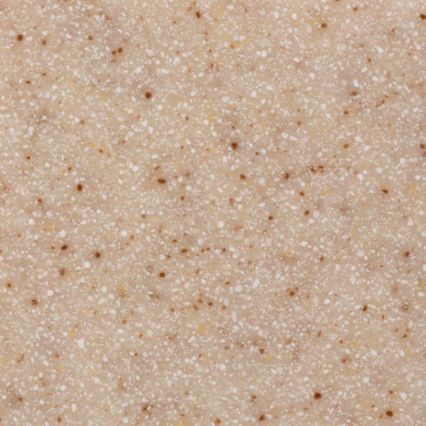 istock Texture new wall of small light beige artificial stone 821060344