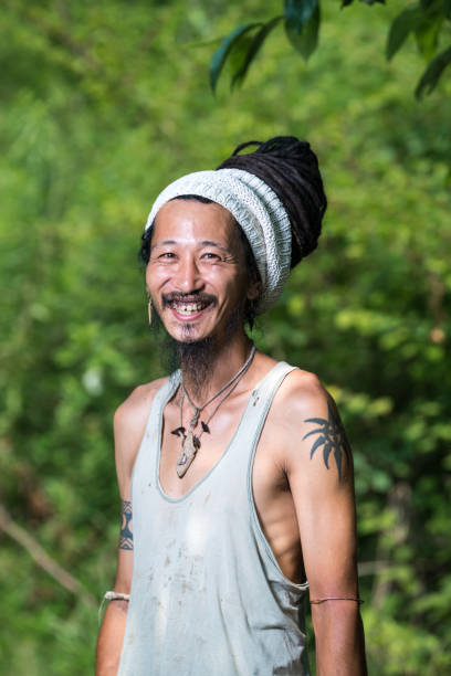 istock A uniquely dressed Japanese man looking very happy and satisfied 821067696