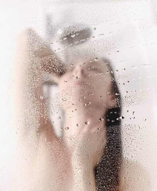 istock Woman washing head 821081764