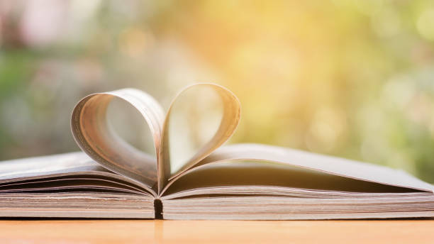 istock The book is placed on a garden table. 821095512