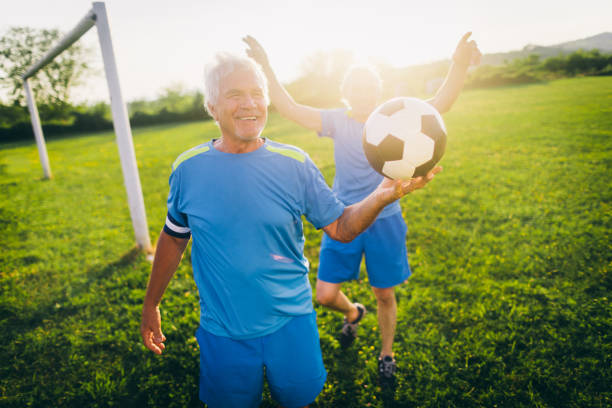 istock Senior soccer players cheering 821101724