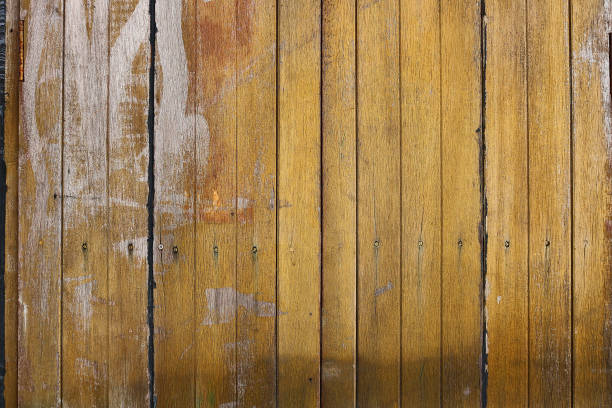istock yellow old wooden window backround 821104356