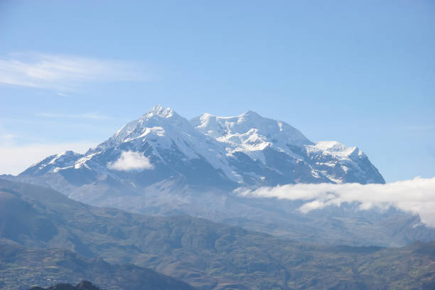 Mount Illimani, near La Paz, Bolivia looms on the horizon stock photo