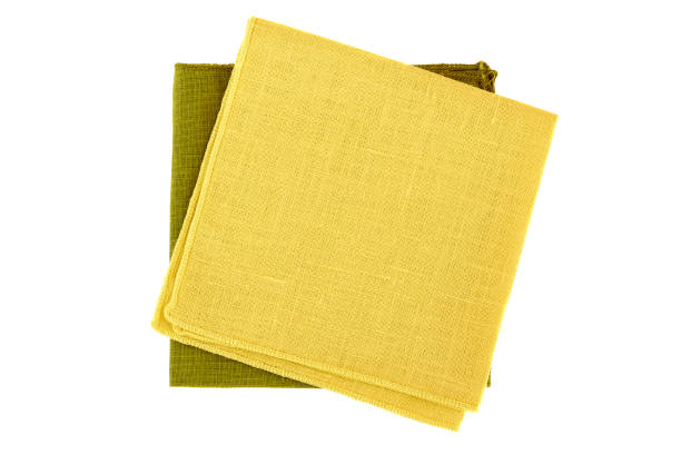 istock Yellow and green textile napkins on white 821104472