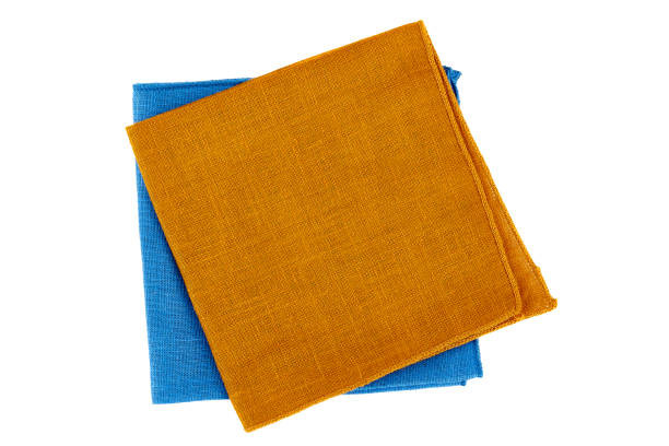 istock Green and blue textile napkins on white 821104960