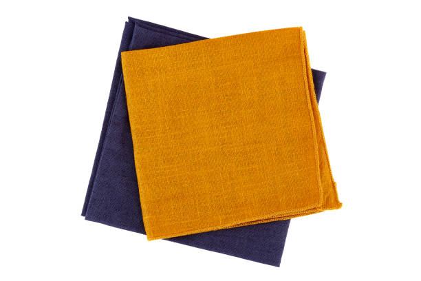 istock Orange and violet textile napkins on white 821111128