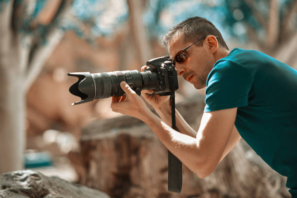 istock photographer in the wilderness 821131610