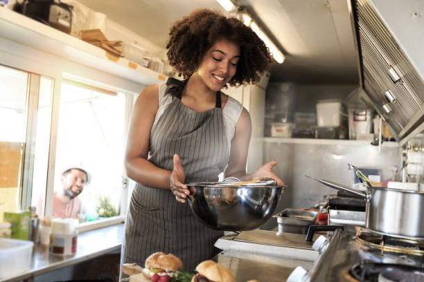 istock Attractive female fast food worker 821134342