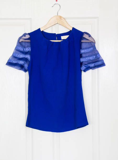 istock Fashion shirt on hanger on a wall 821150036