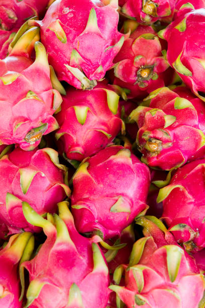 istock Dragon fruit on market stand, Thailand. 821150984