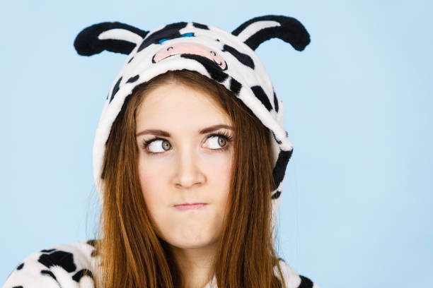 istock Woman wearing pajamas cartoon angry expression 821154266