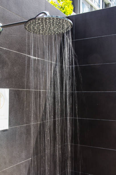 istock Shower head at swimming pool 821154418