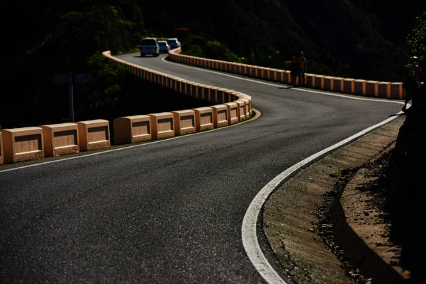 istock winding road in summer day 821157198