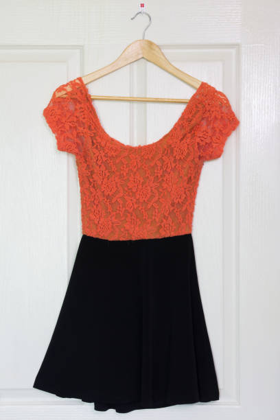 istock Vintage dress on hanger on a wall 821160802