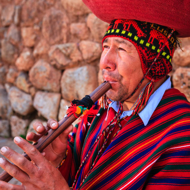 istock Portrait of Peruvian man playing a flute, Sacred Valley 821161400