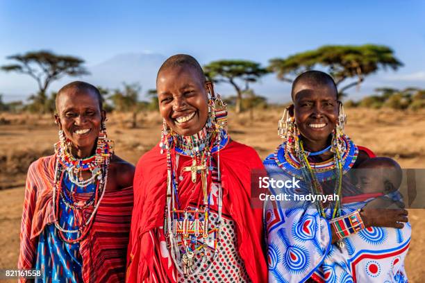 African Woman Carrying Her Baby Kenya East Africa Stock Photo - Download Image Now